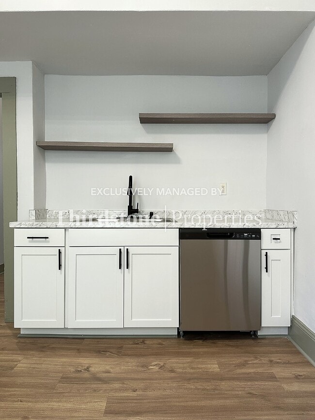 Foto del edificio - 210 E 9th St