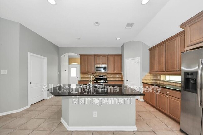 Building Photo - 2402 Village Lakes Dr