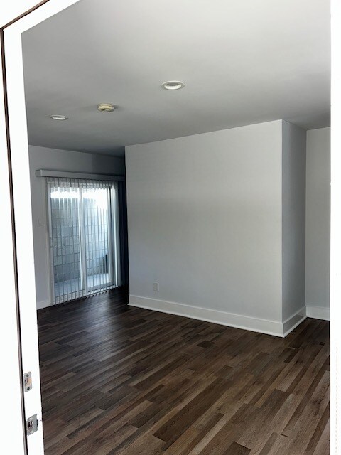 sliding glass doors lead to small patio - 2734 Martha Ave