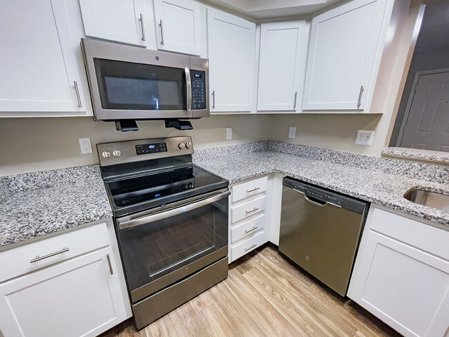 Kitchen with Upgraded Appliances - The Plaza at Lamberton