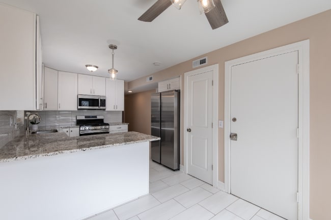 Photo - 8729 W 73rd Pl Apartment