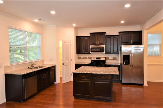 Building Photo - 8117 Wheeler Woods Dr
