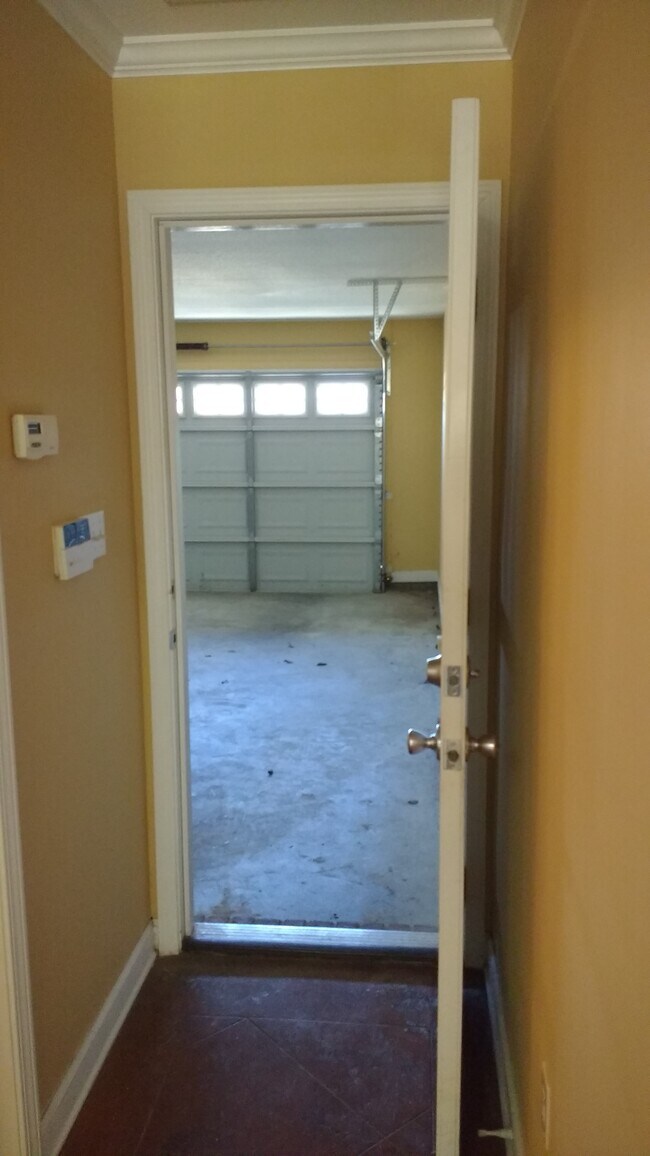 Garage. View from the hallway leading into the kitchen. - 14234 Creekwood Cove