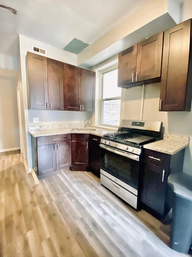 Foto del edificio - 1444 N Talman Ave