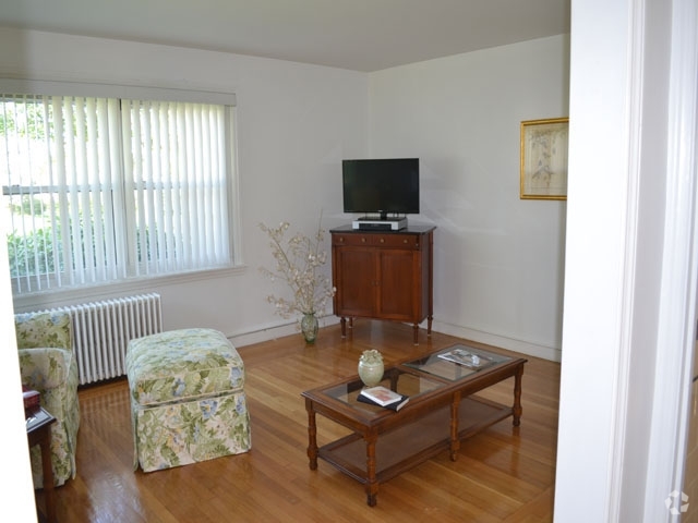 Sala de estar - The Residences at Garden City