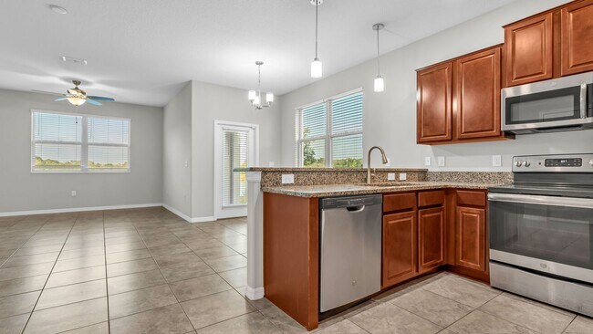 Building Photo - MOVE IN READY! Beautiful two story Townhom...