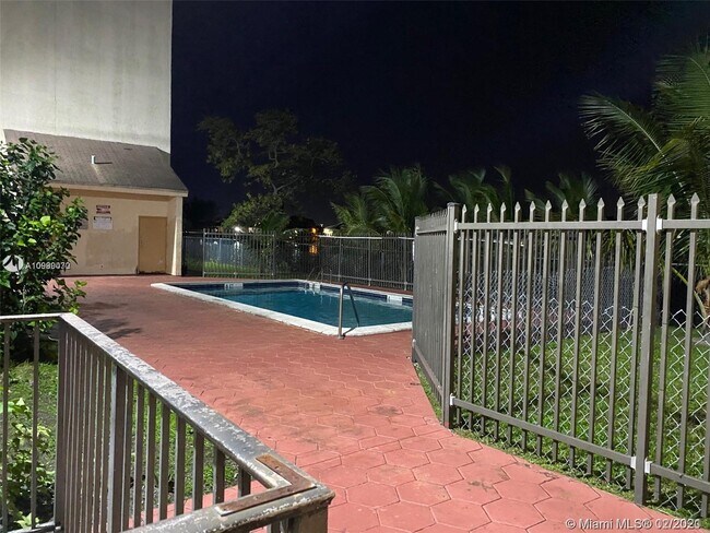 Building Photo - 9917 W Okeechobee Rd