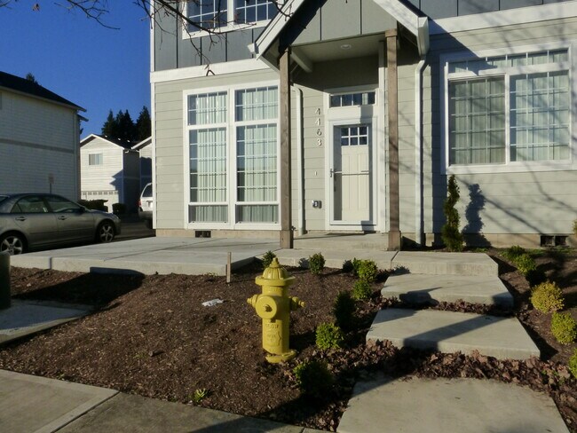 Photo - Beautiful 4 BR, 2 1/2 BA with main floor B... House