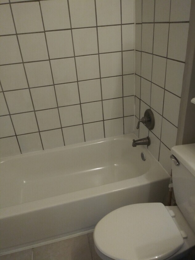 Upstairs full bath - 704 Kolping Ave
