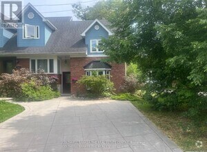 Building Photo - A - 103 STUART Ave S
