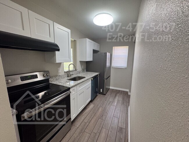 Building Photo - Fully Remodeled 4BR/2BA Home – Move-In Ready!