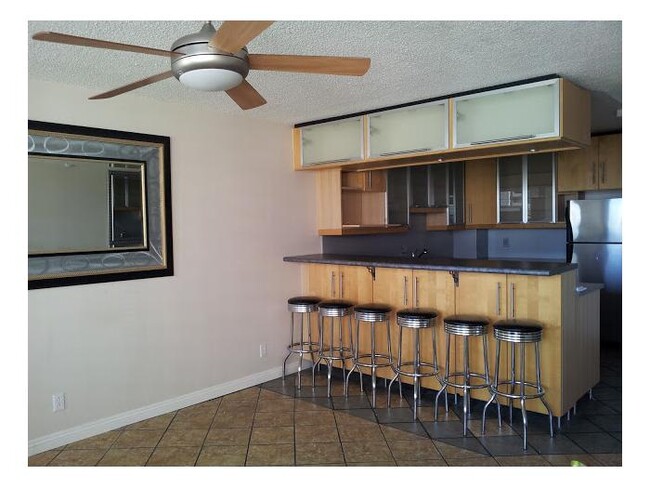 Cabinet storage above and below the bar. - 1255 Nuuanu Ave