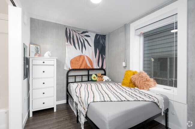 Un dormitorio - MontClair Apartments