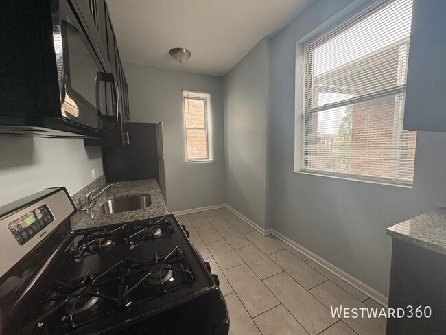 Foto del edificio - 707 E 62nd St