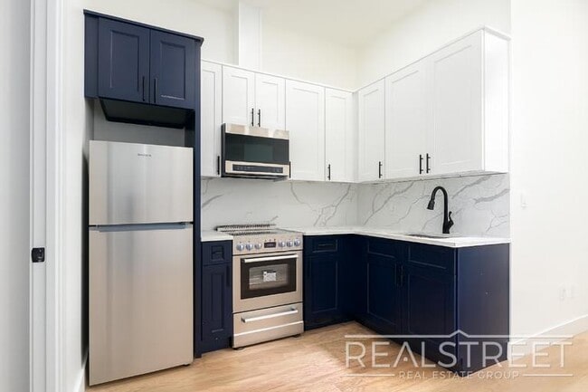 Building Photo - Brand New 4 Bed, 2 Bath with In-Unit Laundry, Private Balcony & Central Air