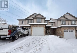 Building Photo - 203 Snowdrop Crescent