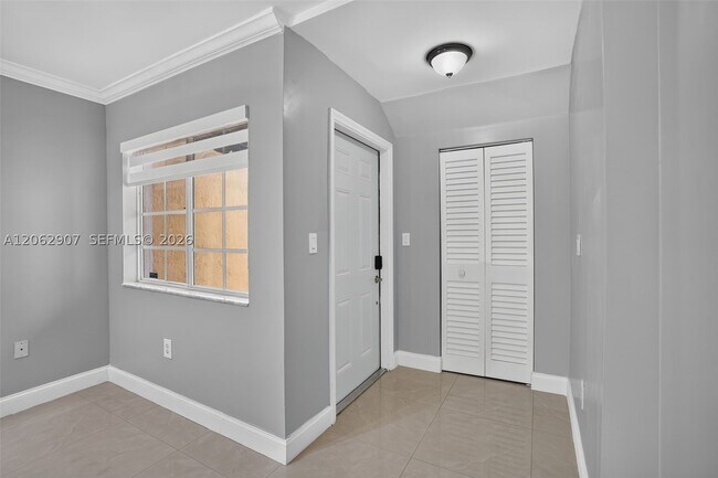Building Photo - 7085 NW 173rd Dr