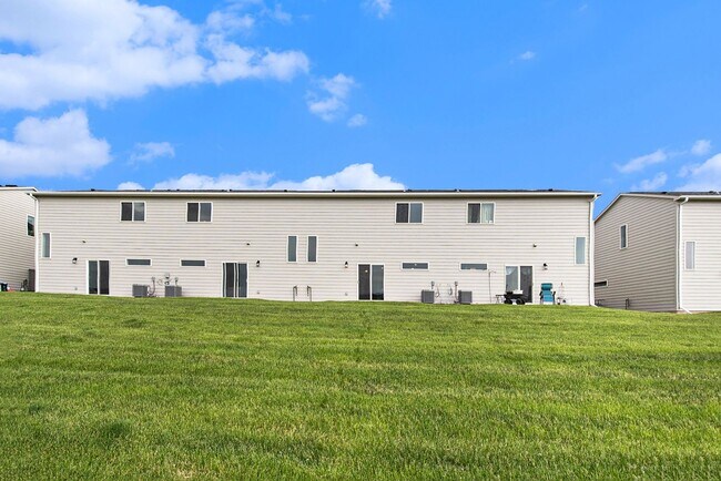 Building Photo - Charming Newly Constructed 3 Bedroom Townhome