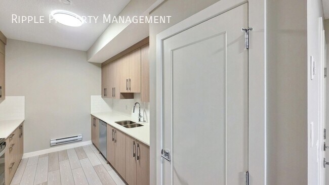 Photo du bâtiment - BRAND NEW 1 BED, 1 BATH BASEMENT SUITE | NEVER LIVED IN & MODERN FINISHES
