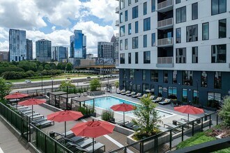 Resort style swimming pool with skyline views - AMLI Atlantic Station