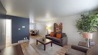 Located at 4312 Westport Rd in Columbus, Ohio, this multi-story home spans three floors and offers a well-organized layout with functional living spaces throughout. The main level opens to a welcoming living room with warm hardwood-style flooring, a neutral color palette accented by a bold dark feature wall, and natural light streaming in from windows. The space flows seamlessly into a dedicated dining area, creating an open and connected feel. The kitchen features rich wood cabinetry, granite-style countertops, a double sink, and hardwood-style flooring, offering ample storage and workspace. An upper level hosts carpeted bedrooms, including a primary bedroom with a sliding-door closet, and an additional bedroom with a window overlooking the exterior. A full bathroom on this level includes a tub-shower combination, tile flooring, and a window for natural ventilation. The stairwell opens to a vaulted ceiling area, adding an airy sense of verticality. The lower finished level offers a carpeted, versatile room suitable for a variety of uses, illuminated by a ceiling fixture. The unfinished basement level provides additional storage or utility space, featuring concrete block walls, exposed wood-beam ceiling, and a glass block window.