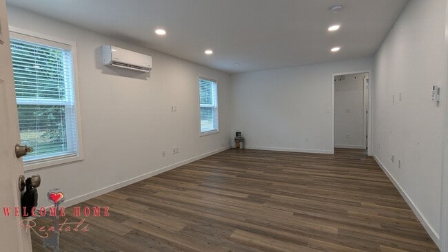 Building Photo - 4 bedroom home with air conditioning - Great location!!!  HUGE basement for your man cave or she ...