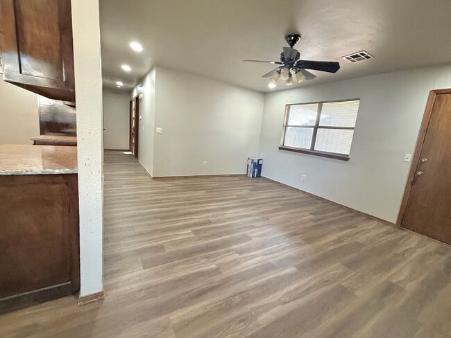 Building Photo - Must see virtually new 3-2-2 home off Broa...