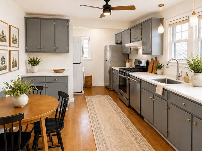 Cocina con espacio para comer y amplios armarios para almacenamiento. - 71 Madison Rd