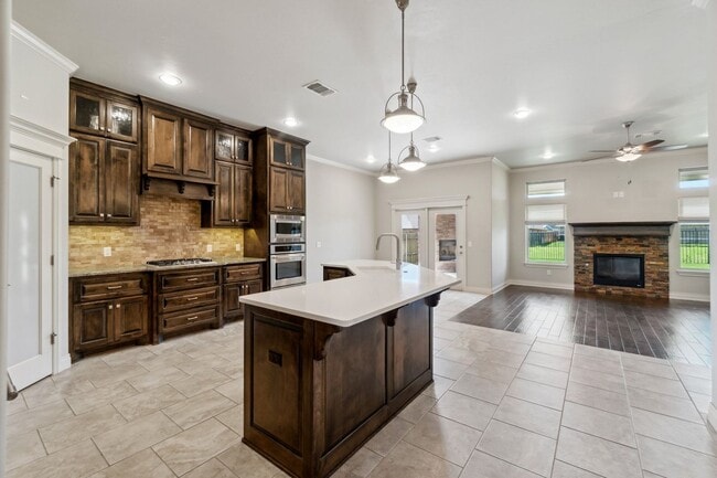 Building Photo - Upscale Comfort Meets Everyday Functionality in This Stunning 3-Car Garage Home!