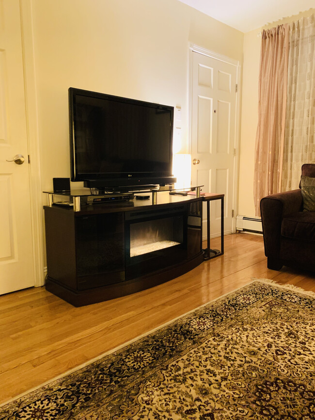 TV and electric fireplace - 119 Willow St