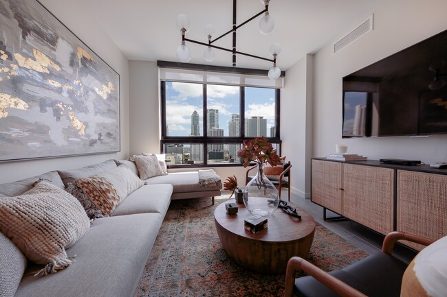 Living Room & Expansive Windows | Grand Station Miami - Grand Station