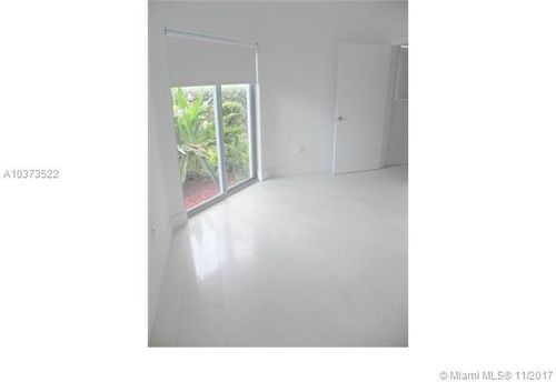 Building Photo - 7728 Collins Ave