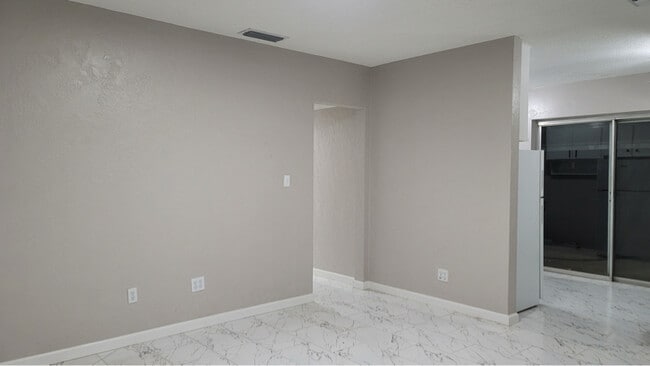 Building Photo - 7115 N Tampania Ave