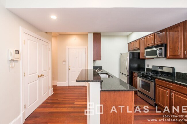 Building Photo - Available Now! Gorgeous 2 Bedroom Condo in...