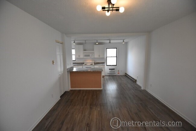 open concept living room/kitchen - 427 E Gates St