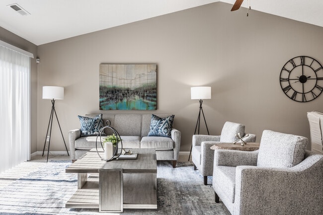 Living Room with Ceiling Fan - Wheaton Village Apartments