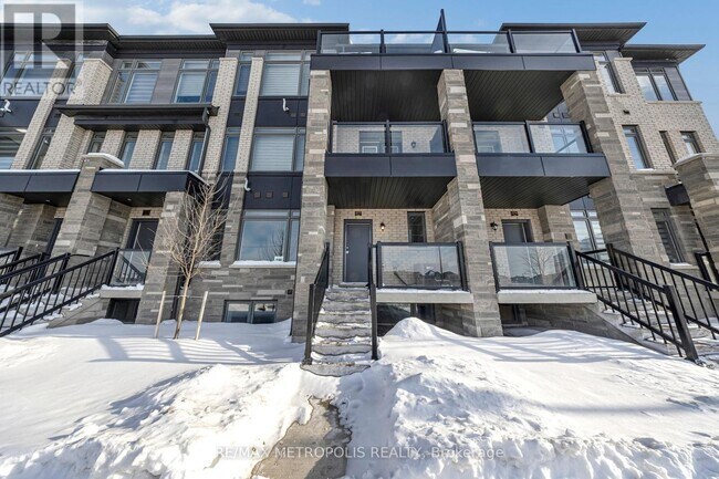 Photo du bâtiment - 577 Tim Manley Ave