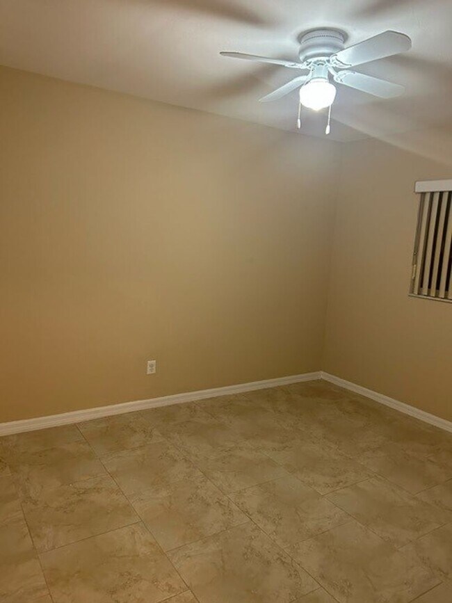 Building Photo - SW area All Tiled Home with a Fenced in Ya...
