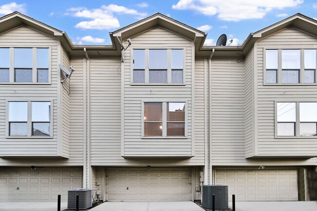 Building Photo - Gorgeous and spacious three-story townhome!