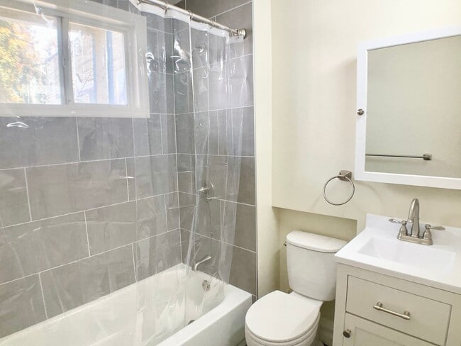 Building Photo - LOWERED PRICE! FULL FLOOR FLAT! Bay Window...