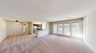This 1090 square foot single-story residence in Richmond, Virginia offers a well-designed layout with three bedrooms and two bathrooms. The home features a blend of contemporary finishes and practical amenities. The kitchen is a highlight, boasting granite countertops, stainless steel appliances, and ample cabinet space. The living area is open and spacious, with plush carpeting and large windows that allow natural light to flood the space.

The primary bedroom, measuring 170 square feet, provides a generous retreat. All bedrooms feature neutral color schemes and carpeted floors, creating a cozy atmosphere. The bathrooms are modern and functional, with one showcasing a bathtub-shower combination.

The property includes a dedicated laundry room with full-sized washer and dryer, adding convenience to daily living. Large windows throughout the home, many with horizontal blinds, offer views of the surrounding area and contribute to the bright, airy feel of the space.

The home's neutral color palette, combined with a mix of carpeted and wood-look flooring, creates a versatile canvas for various decorating styles. With its thoughtful design and desirable features, this property presents an attractive option for those seeking a comfortable and contemporary living space in Richmond.