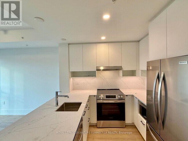 Photo du bâtiment - 206 King St W