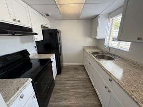 868 sq ft Renovated Kitchen - Golfview Apartments