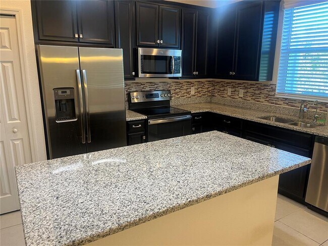 Foto del edificio - 6857 Tussilago Way