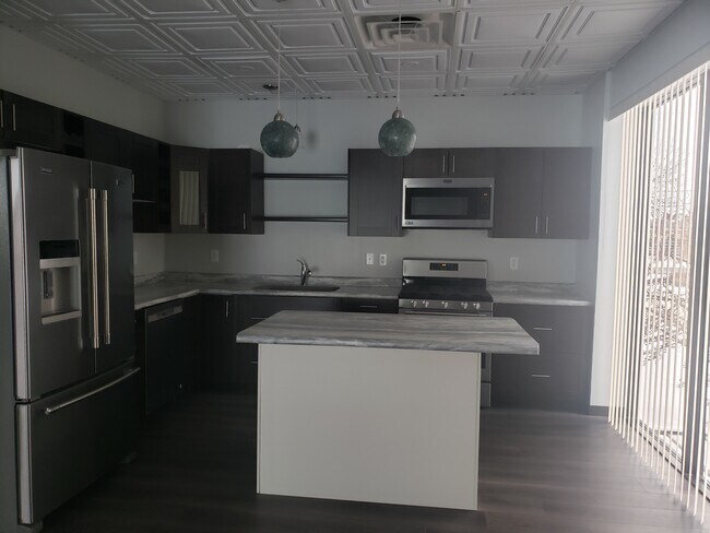 Foto del edificio - 118 Center St W