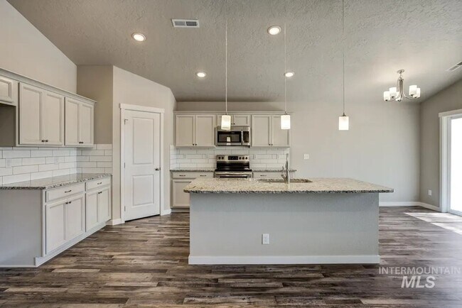 Building Photo - Must See 3 bed plus a office with a 3 Car ...