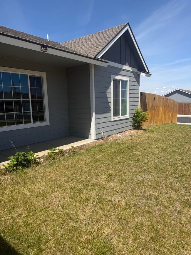 Building Photo - Lots of storage space in this 4- Car garage for all your playthings!!