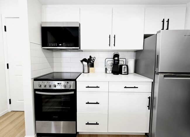 Building Photo - 9703-9115 115 Ave NW