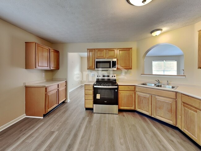 Building Photo - 5220 Bogey Dr