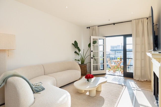 2BR, 2BA - 1,100SF - Living Room - Plymouth Apartments